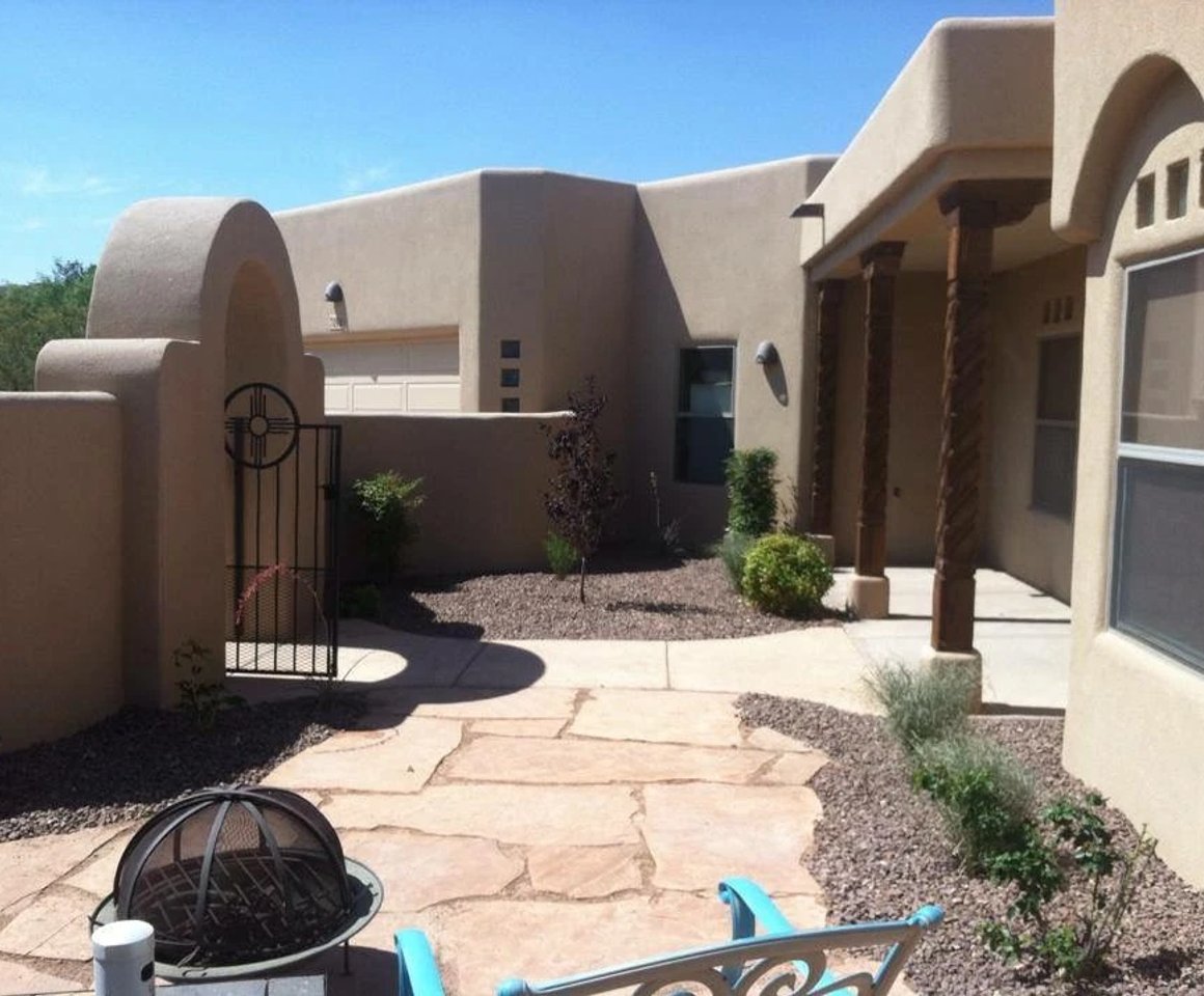 Flagstone patio install on a Las Alturas neighborhood landscape renovation