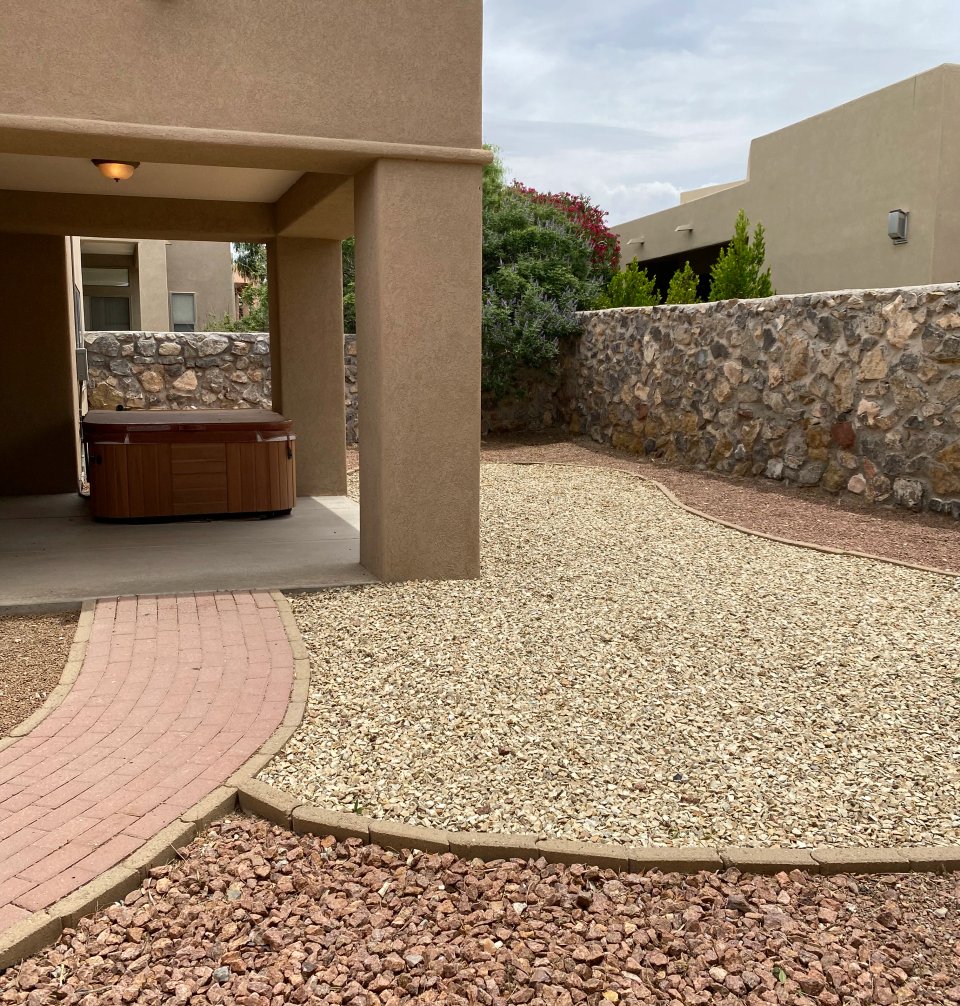 Paver patio install on a mature landscape renovation in Las Alturas, NM