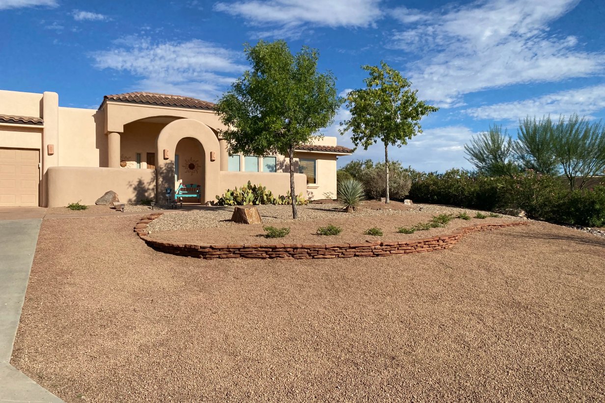 Stone bed border and retaining wall rebuild in Las Alturas