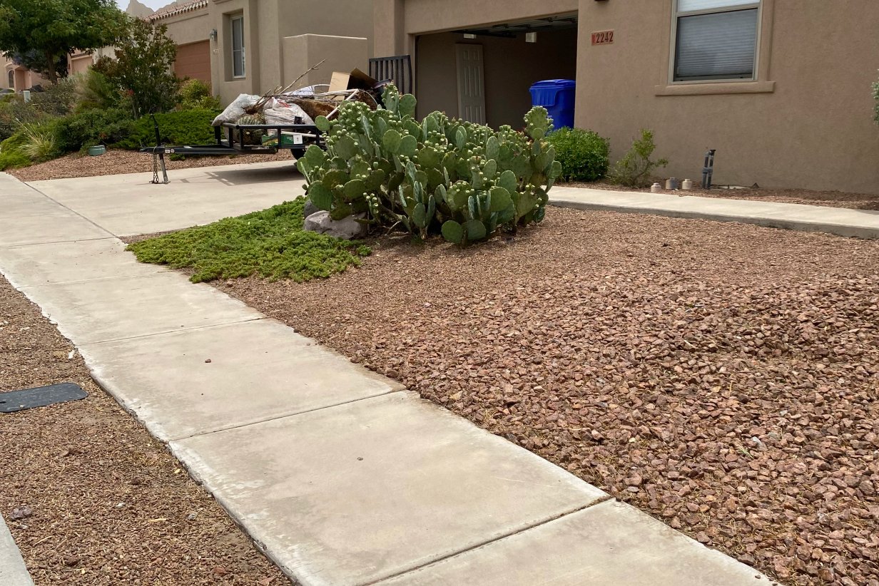 Boulder-integrated xeriscape on a Talavera foothill lot