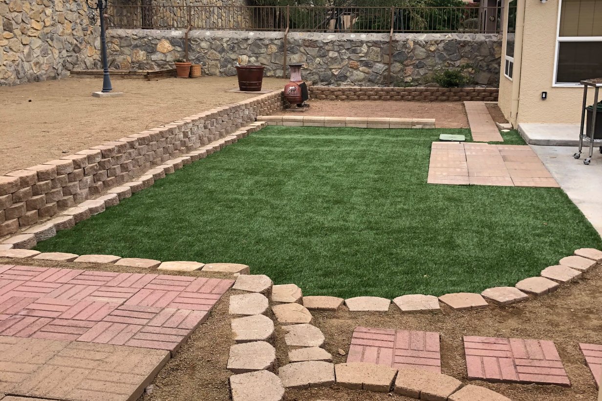 Builder-grade landscape upgraded with native plantings on an East Mesa property